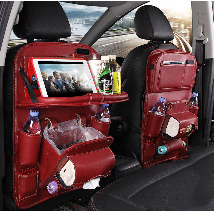 Leather car seat organizer with tablet holder and drink storage for a clutter-free ride.