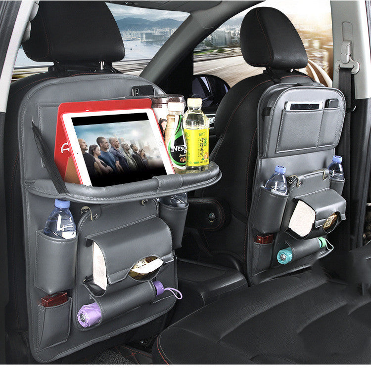 Leather car seat organizer with tablet holder and drink storage for a clutter-free ride.