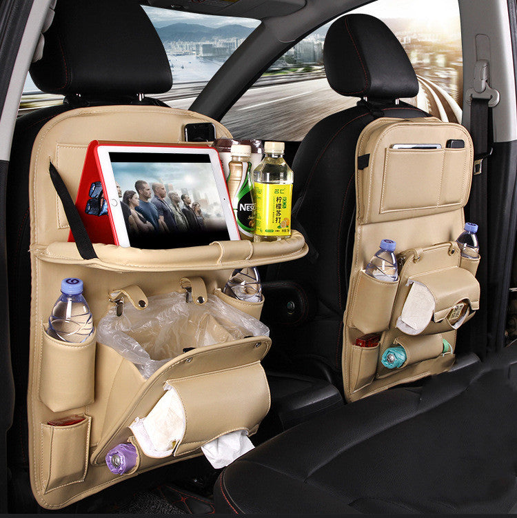 Leather car seat organizer with tablet holder and drink storage for a clutter-free ride.