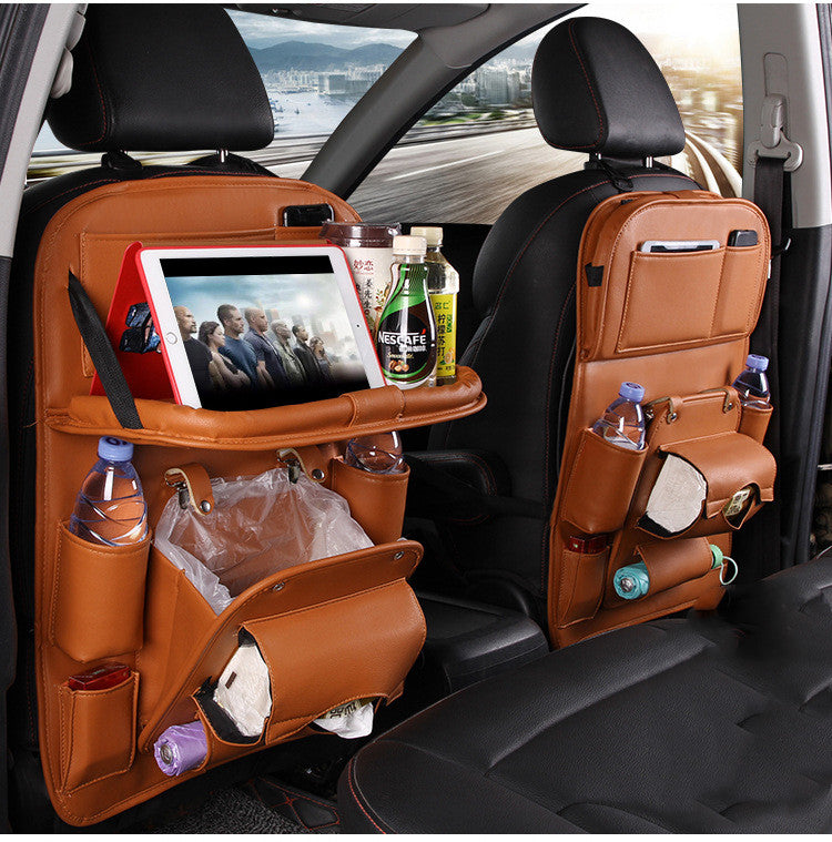 Leather car seat organizer with tablet holder and drink storage for a clutter-free ride.
