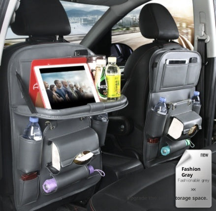 Leather car seat organizer with tablet holder and drink storage for a clutter-free ride.